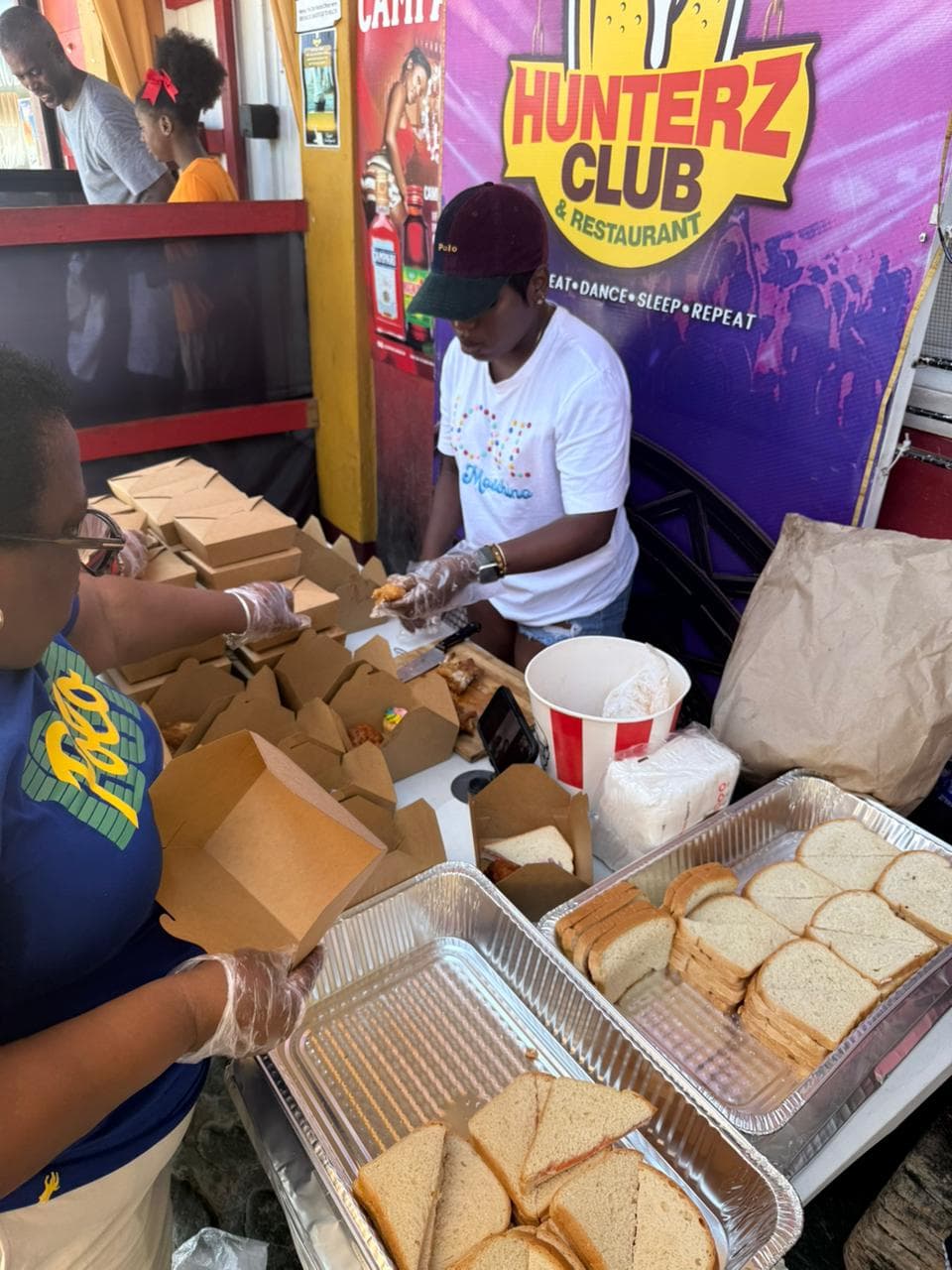 Packing food boxes for community distribution